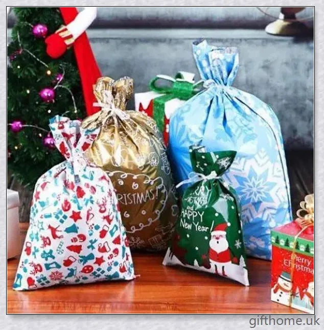 15 sets of drawstring Christmas gift bags in various sizes and festive designs