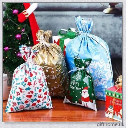 15 sets of drawstring Christmas gift bags in various sizes and festive designs