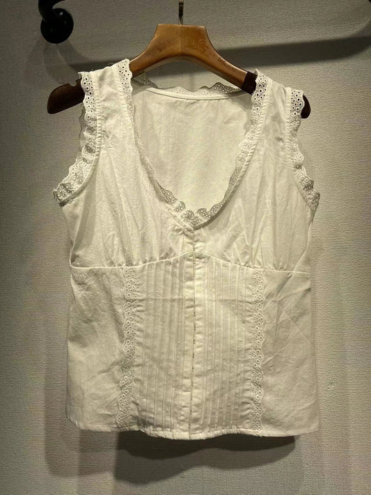 Elegant white tank top with embroidered lace detailing and a sweet U-collar neckline, perfect for British-inspired casual and formal wear.