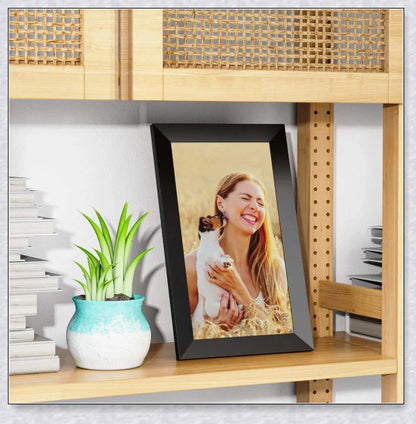 Smart Electronic WiFi Digital Photo and Video Picture Frame in black, displaying a slideshow of family photos and videos on a 10.1-inch HD IPS display