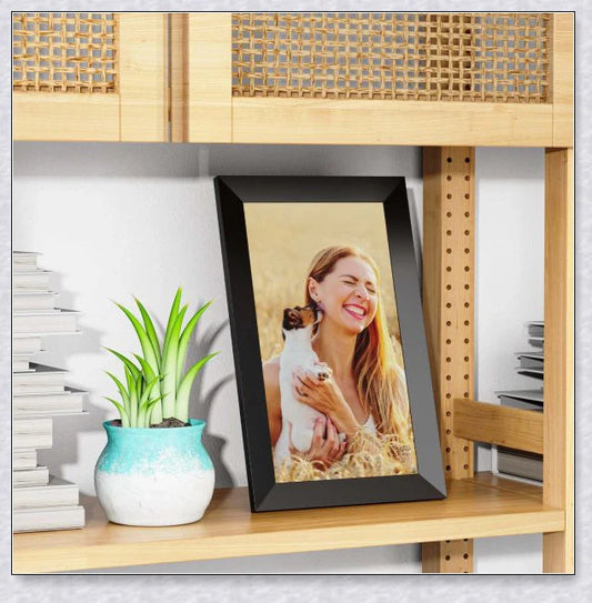 Smart Electronic WiFi Digital Photo and Video Picture Frame in black, displaying a slideshow of family photos and videos on a 10.1-inch HD IPS display
