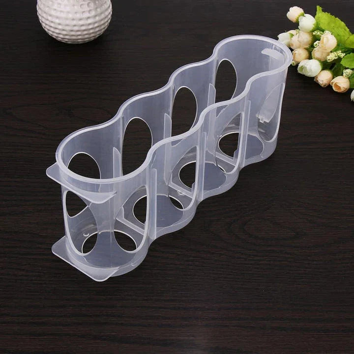 A clear, plastic fridge organiser designed to neatly store bottles, jars, and containers in the refrigerator.