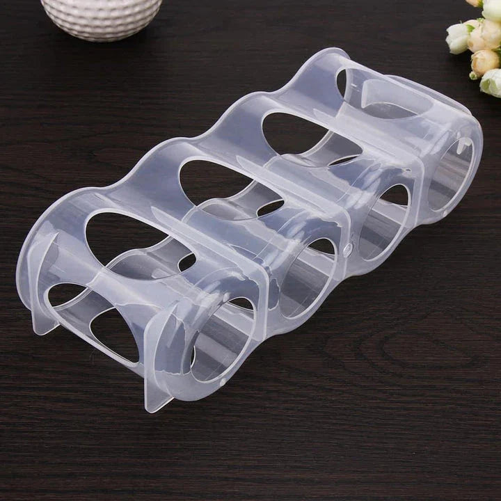 A clear, plastic fridge organiser designed to neatly store bottles, jars, and containers in the refrigerator.