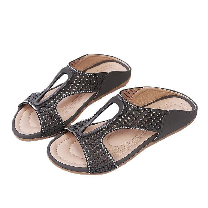 Fashionable rhinestone-embellished casual slippers with a hollow design, available in a range of sizes for comfortable all-day wear.