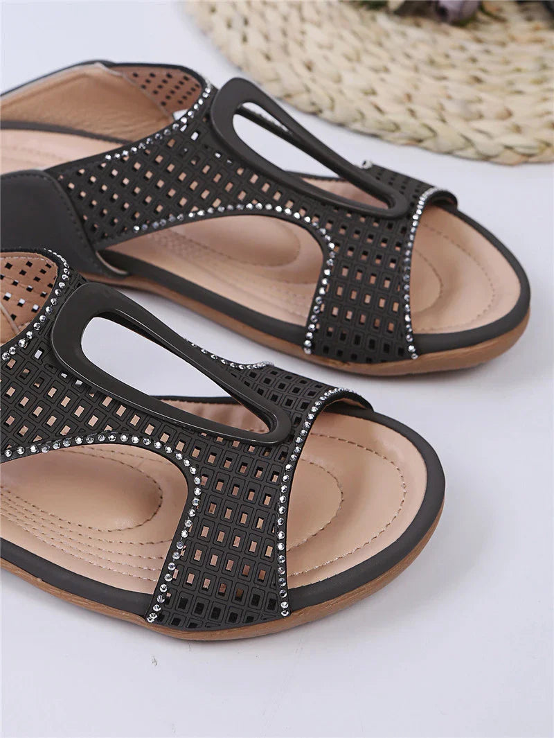 Fashionable rhinestone-embellished casual slippers with a hollow design, available in a range of sizes for comfortable all-day wear.