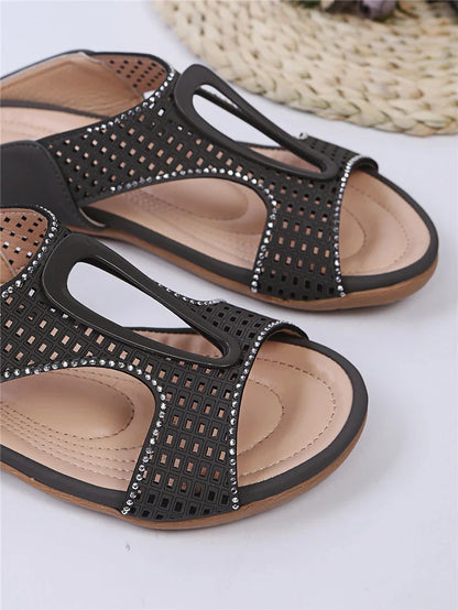 Fashionable rhinestone-embellished casual slippers with a hollow design, available in a range of sizes for comfortable all-day wear.
