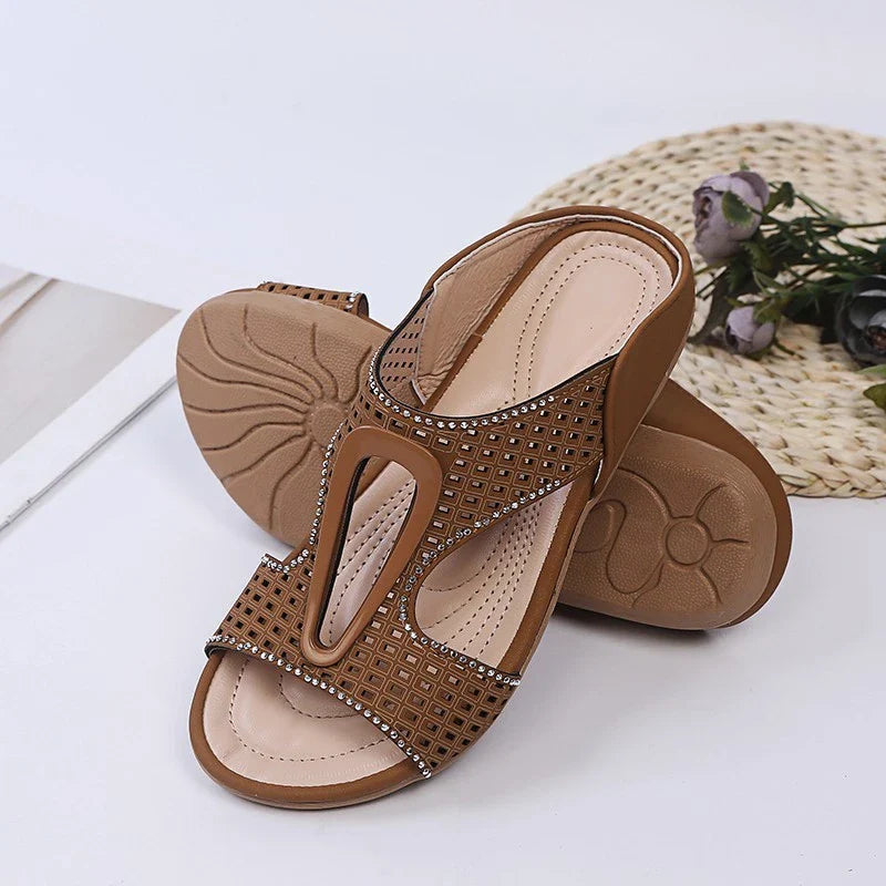Fashionable rhinestone-embellished casual slippers with a hollow design, available in a range of sizes for comfortable all-day wear.