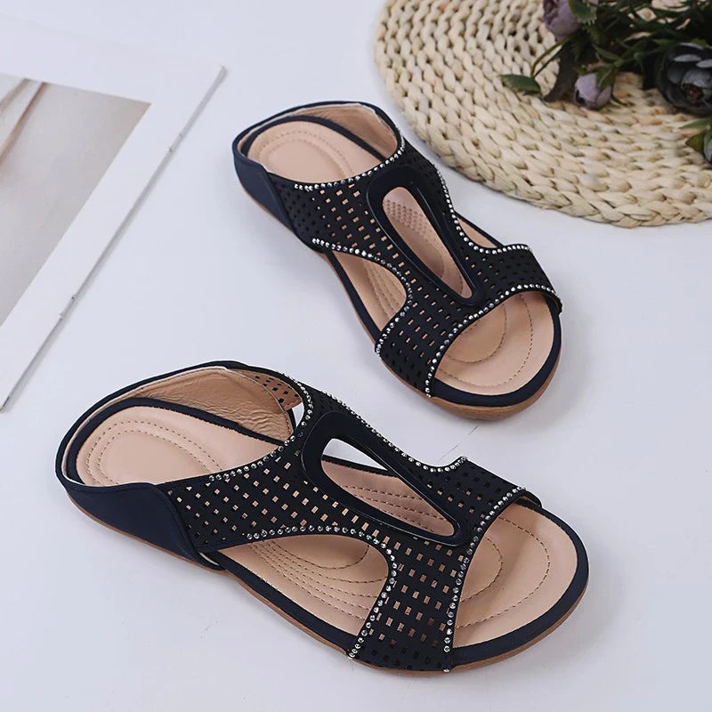 Fashionable rhinestone-embellished casual slippers with a hollow design, available in a range of sizes for comfortable all-day wear.