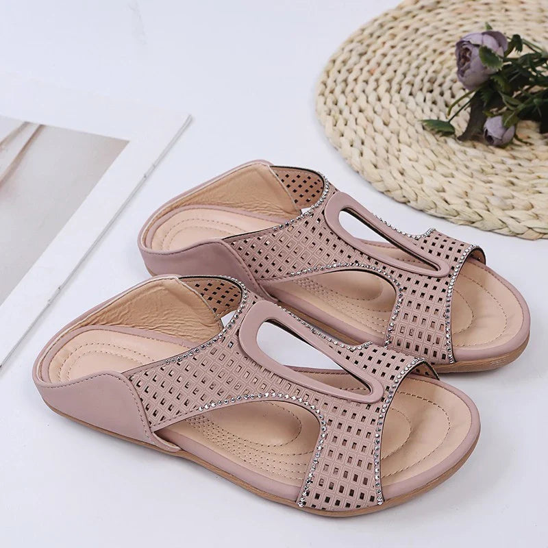 Fashionable rhinestone-embellished casual slippers with a hollow design, available in a range of sizes for comfortable all-day wear.