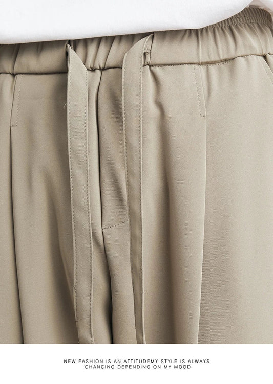 Sophisticated ice silk straight-leg trousers in a range of colours, designed with advanced draping and wrinkle-resistant properties for effortless style.