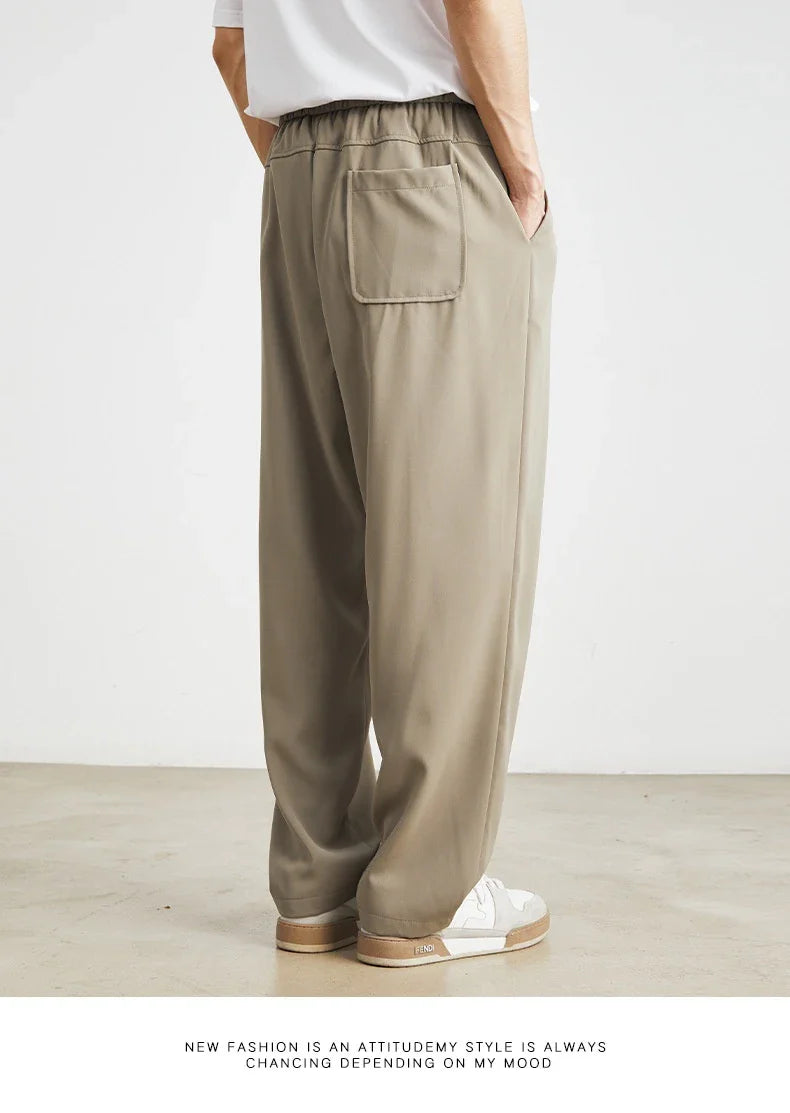 Sophisticated ice silk straight-leg trousers in a range of colours, designed with advanced draping and wrinkle-resistant properties for effortless style.