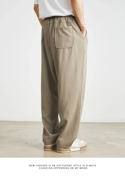 Sophisticated ice silk straight-leg trousers in a range of colours, designed with advanced draping and wrinkle-resistant properties for effortless style.