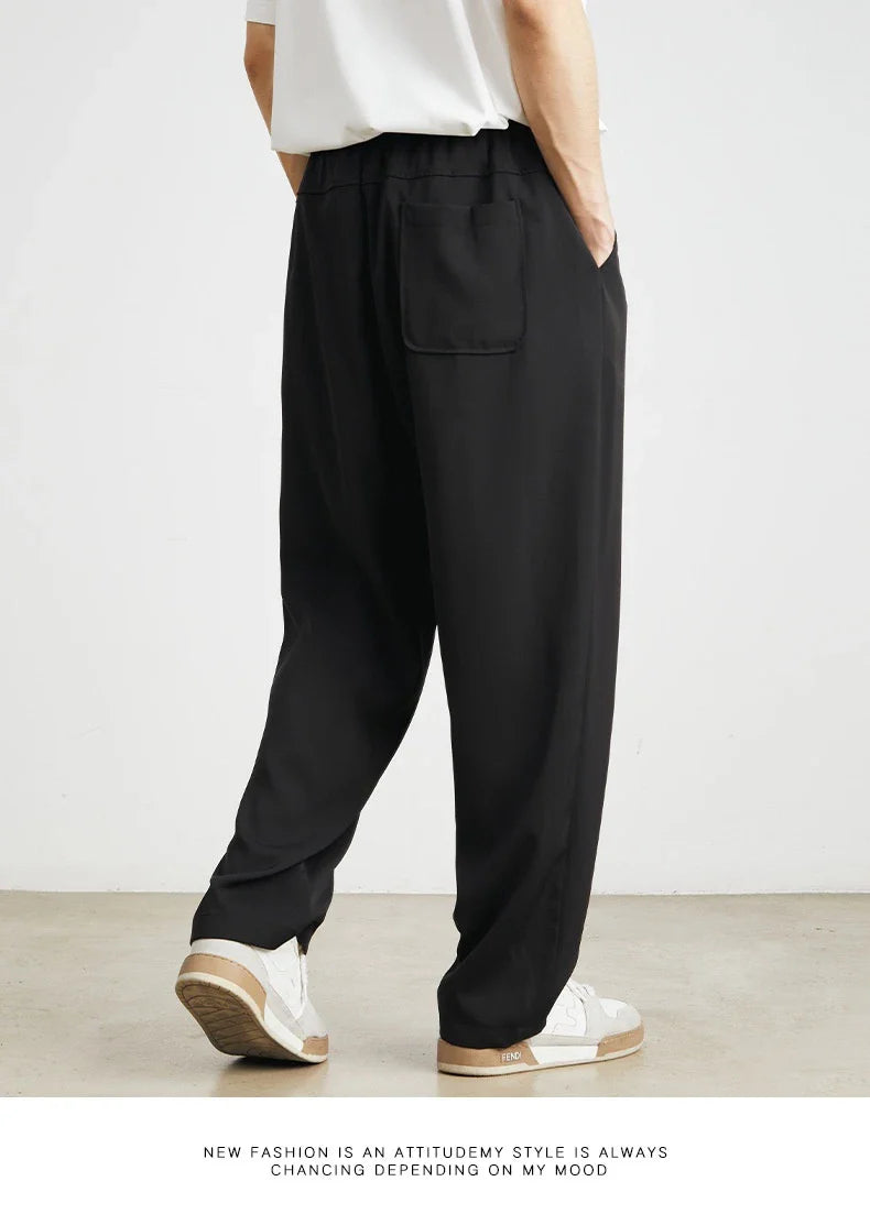 Sophisticated ice silk straight-leg trousers in a range of colours, designed with advanced draping and wrinkle-resistant properties for effortless style.