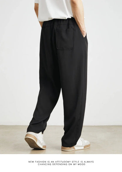 Sophisticated ice silk straight-leg trousers in a range of colours, designed with advanced draping and wrinkle-resistant properties for effortless style.