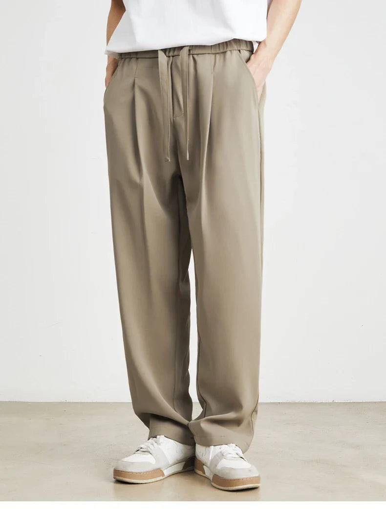 Sophisticated ice silk straight-leg trousers in a range of colours, designed with advanced draping and wrinkle-resistant properties for effortless style.
