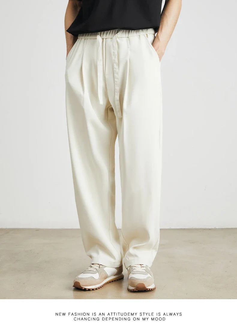 Sophisticated ice silk straight-leg trousers in a range of colours, designed with advanced draping and wrinkle-resistant properties for effortless style.