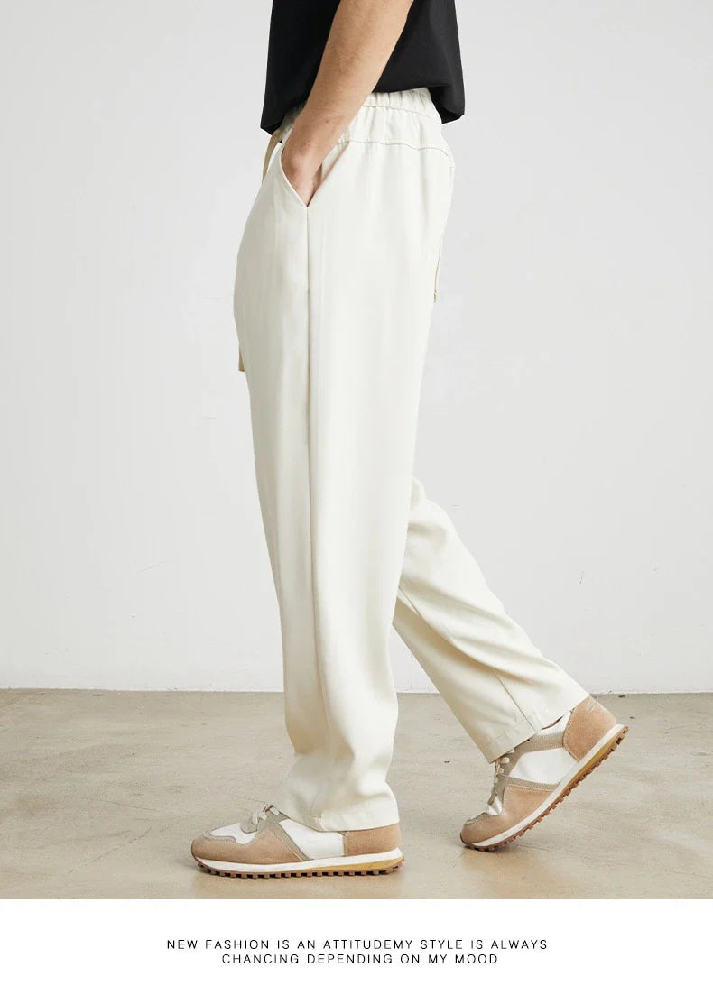 Sophisticated ice silk straight-leg trousers in a range of colours, designed with advanced draping and wrinkle-resistant properties for effortless style.