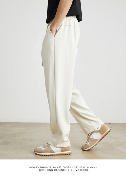 Sophisticated ice silk straight-leg trousers in a range of colours, designed with advanced draping and wrinkle-resistant properties for effortless style.