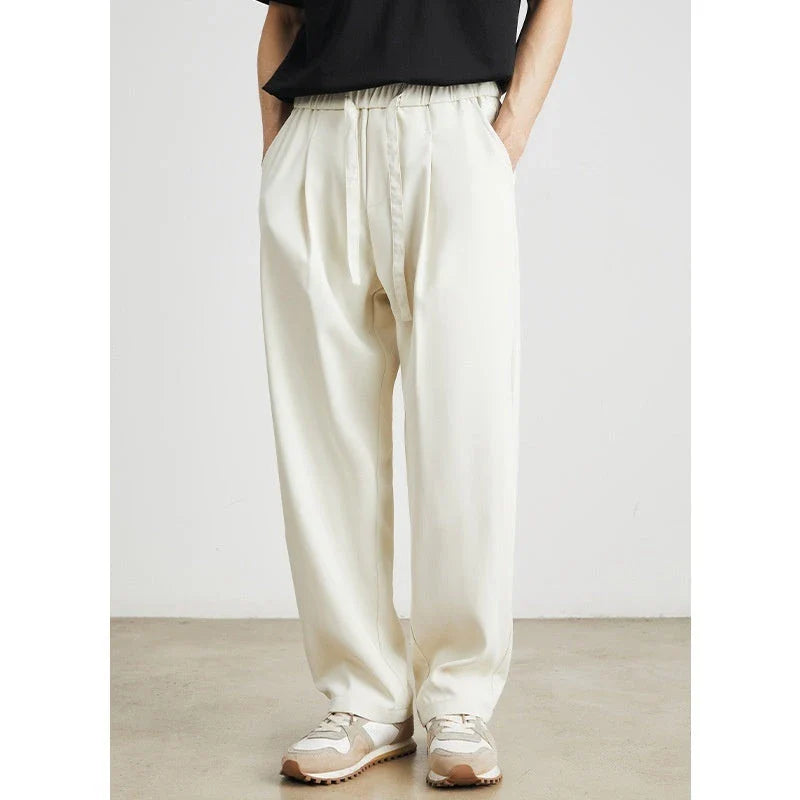 Sophisticated ice silk straight-leg trousers in a range of colours, designed with advanced draping and wrinkle-resistant properties for effortless style.