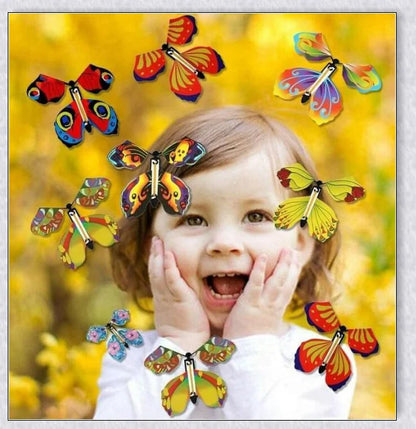 Colourful magic flying butterflies taking flight from a greeting card or book, creating a delightful surprise