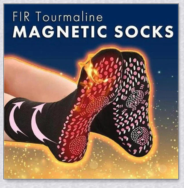 A pair of self-warming massage socks in black, red, and white colours