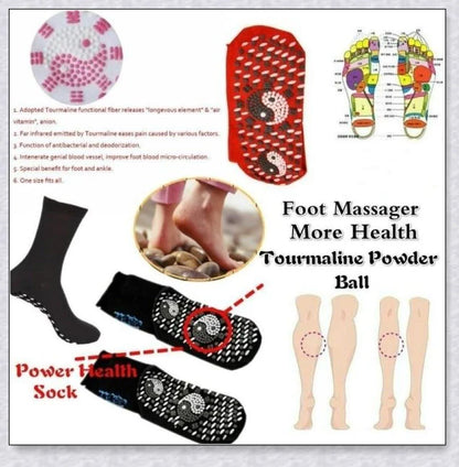 A pair of self-warming massage socks in black, red, and white colours