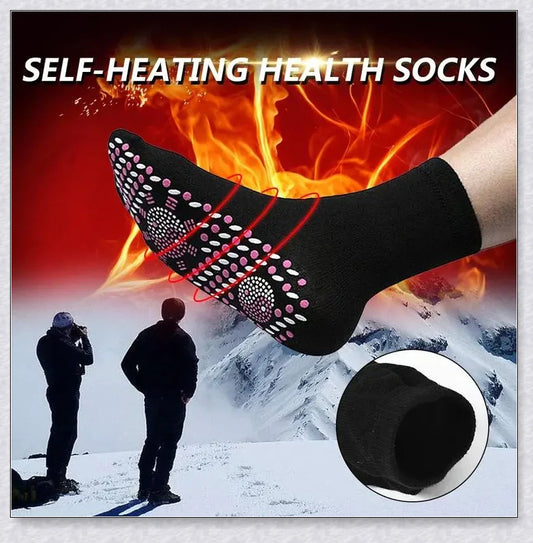 A pair of self-warming massage socks in black, red, and white colours