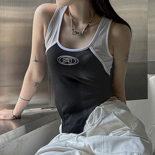 A stylish black suspender vest with functional stitching and a contoured hem, perfect for elevating any outfit