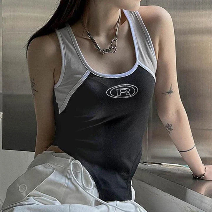 A stylish black suspender vest with functional stitching and a contoured hem, perfect for elevating any outfit