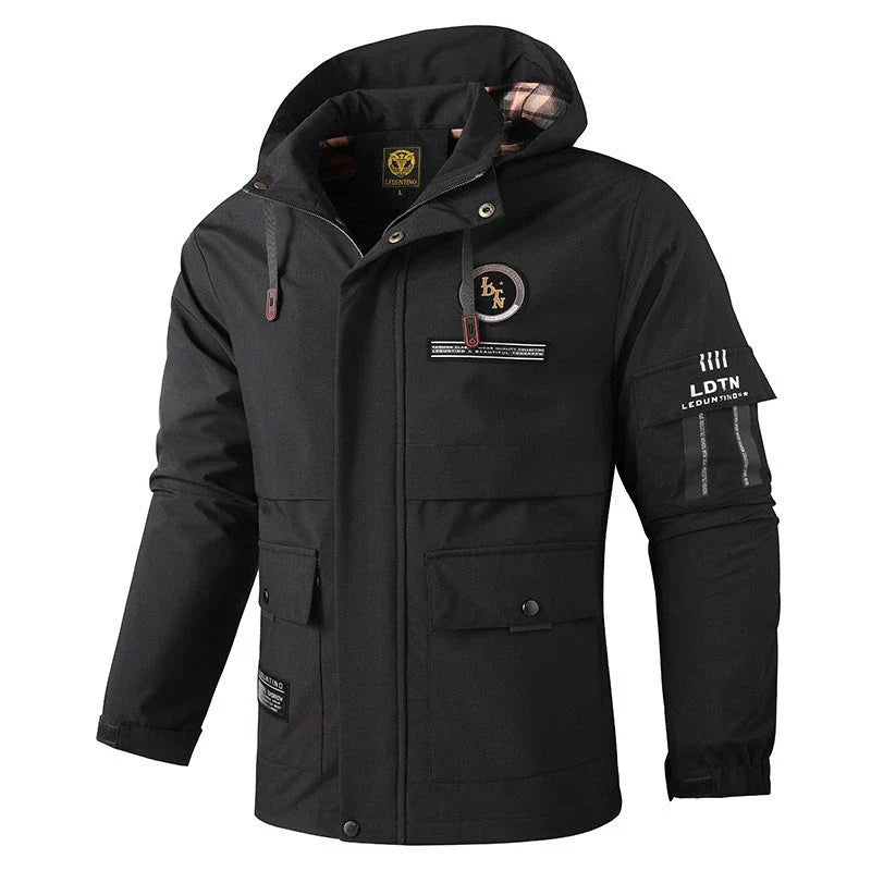 Premium waterproof hooded jacket in black, red, and white colours with dimensional patch pockets and a straight hem design.
