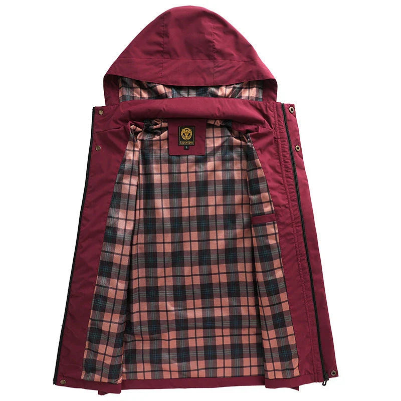 Premium waterproof hooded jacket in black, red, and white colours with dimensional patch pockets and a straight hem design.