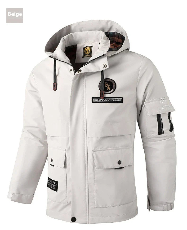 Premium waterproof hooded jacket in black, red, and white colours with dimensional patch pockets and a straight hem design.
