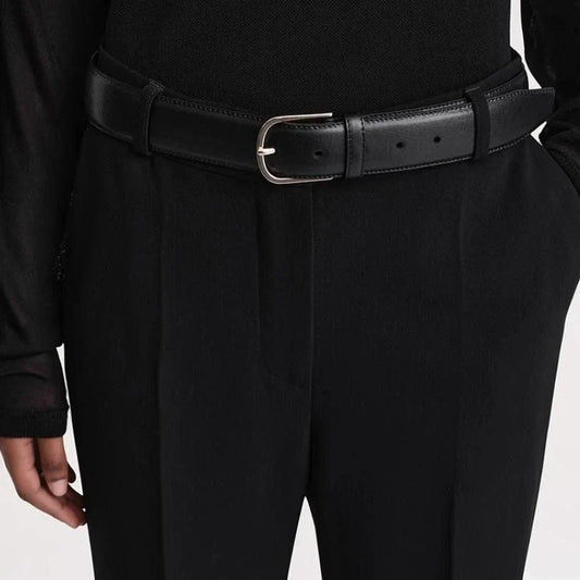 Elegant high-waist flared trousers for women, featuring a sleek boot-cut design and a comfortable, flattering fit.
