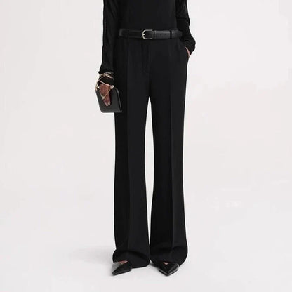 Elegant high-waist flared trousers for women, featuring a sleek boot-cut design and a comfortable, flattering fit.