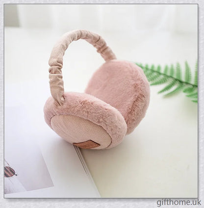 Bluetooth headphones with warm, plush earmuffs in a foldable, adjustable design for comfortable winter wear