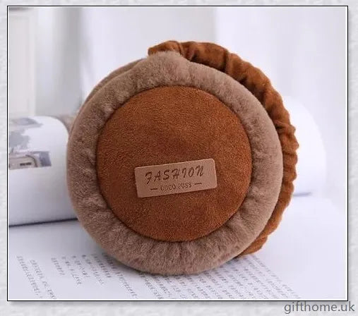 Bluetooth headphones with warm, plush earmuffs in a foldable, adjustable design for comfortable winter wear