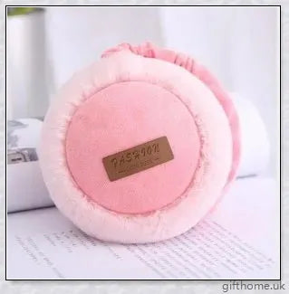 Bluetooth headphones with warm, plush earmuffs in a foldable, adjustable design for comfortable winter wear