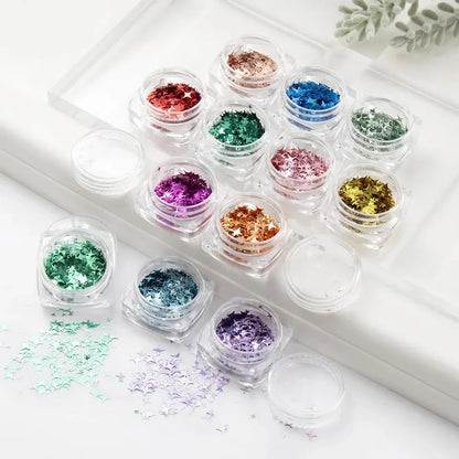 12 vibrant glitter star-shaped nail art sequins in a variety of eye-catching colours