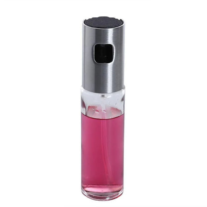 Premium Glass and Stainless Steel Oil Spray with a gold-coloured cap, designed to elevate your cooking experience with precision control and style.