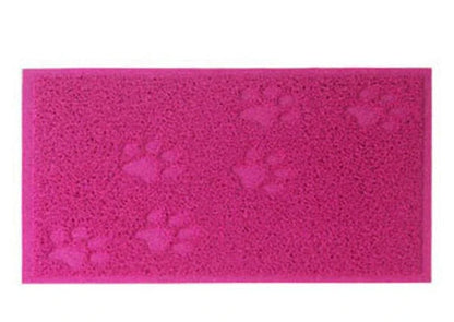 Colourful pet feeding mat made of durable PVC material, with a vibrant green design and slip-resistant surface to keep bowls in place during mealtimes.