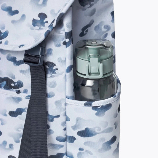 A premium backpack with a stylish dragon camouflage design, featuring a spacious interior, comfortable straps, and secure closures for the modern student.