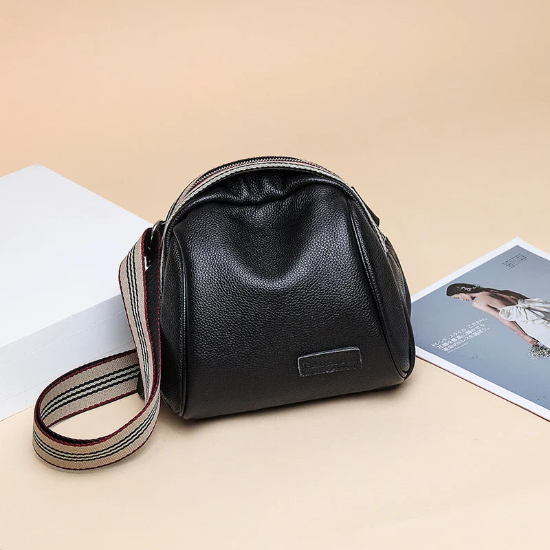 Premium cowhide one-shoulder messenger bag in classic colours for versatile daily use
