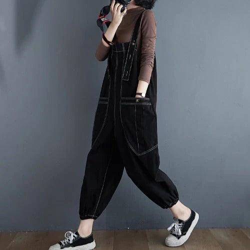 Stylish plus-size black and yellow dungarees in a comfortable, fashionable design for the modern commuter