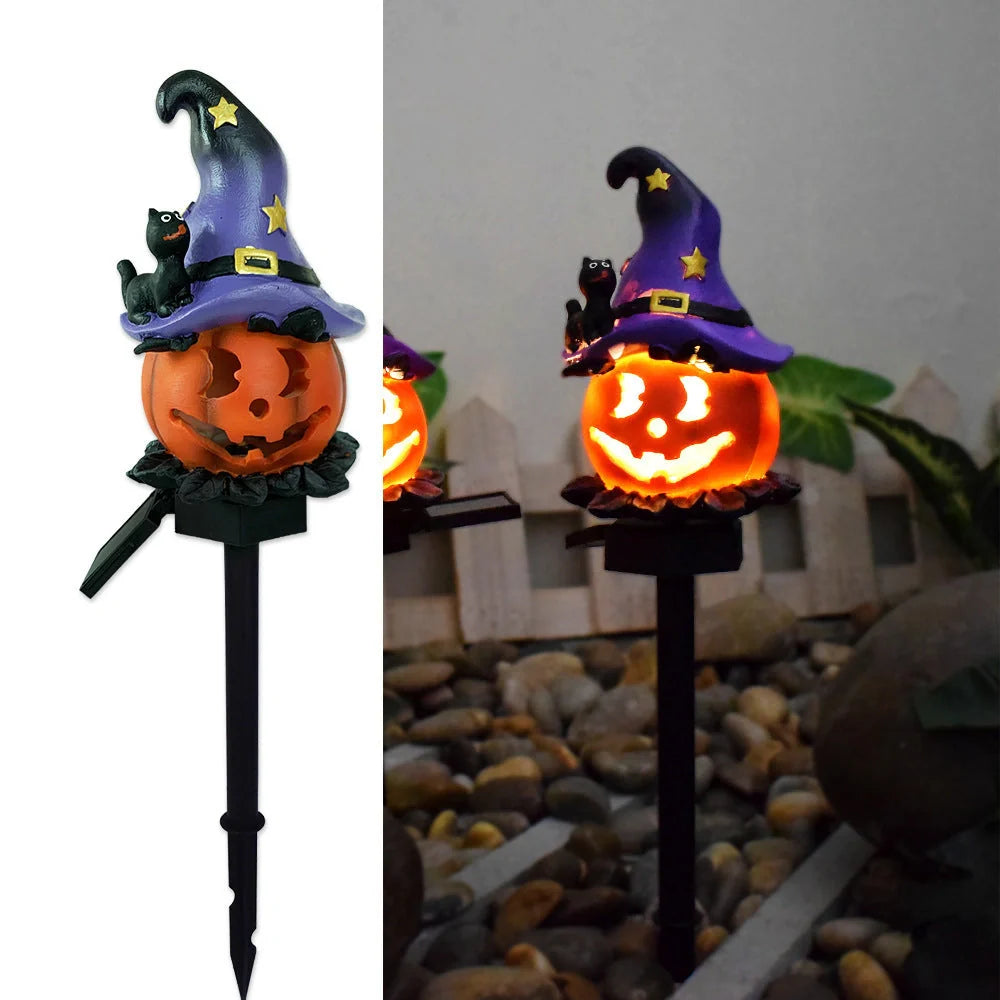 Solar-powered Halloween pumpkin lanterns in garden setting
