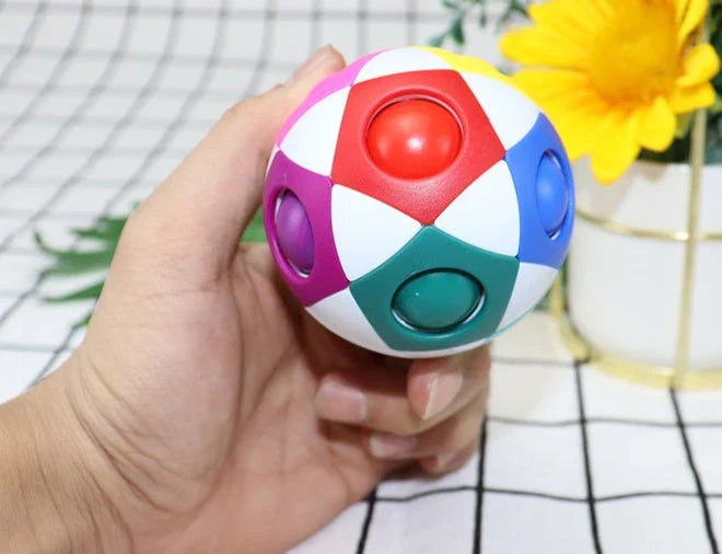 Colorful rainbow-patterned decompression soccer ball with 12 holes, a unique intellectual toy for children