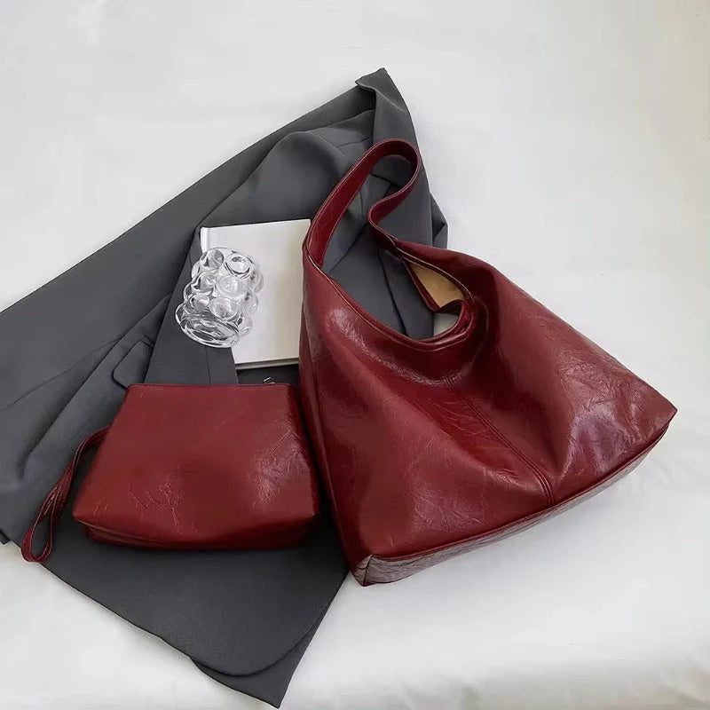 Elegant vintage designer women's shoulder bag in various colours