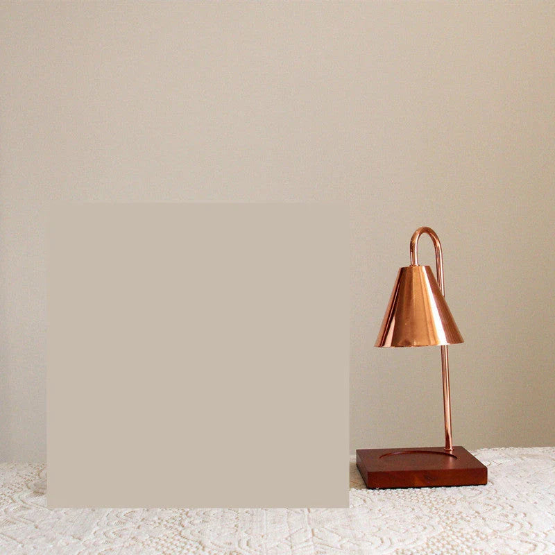 Elegant aromatherapy lamp with a curvy, semi-matte stem design for soothing scents and soft lighting