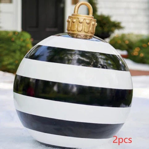 Inflatable Christmas baubles in various festive designs for outdoor holiday decoration