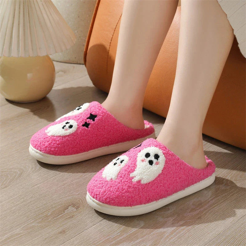 Cozy Halloween-themed cartoon ghost slippers with soft cotton construction and non-slip soles for comfortable indoor wear