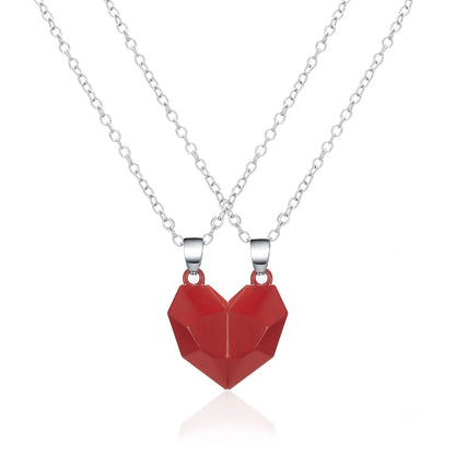 Minimalist gold-plated magnetic heart pendant couple necklace symbolising love and connection.